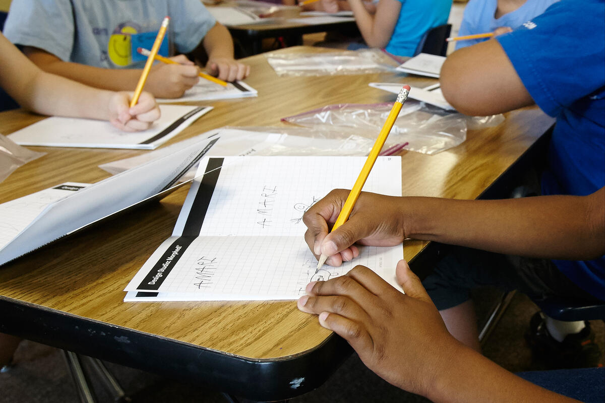 students practice their handwriting