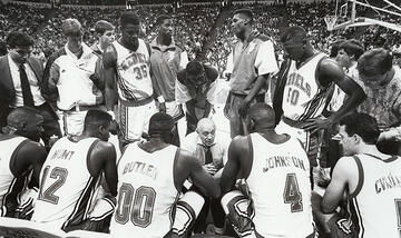 A home game huddle during the Final Four years of the 1990s.